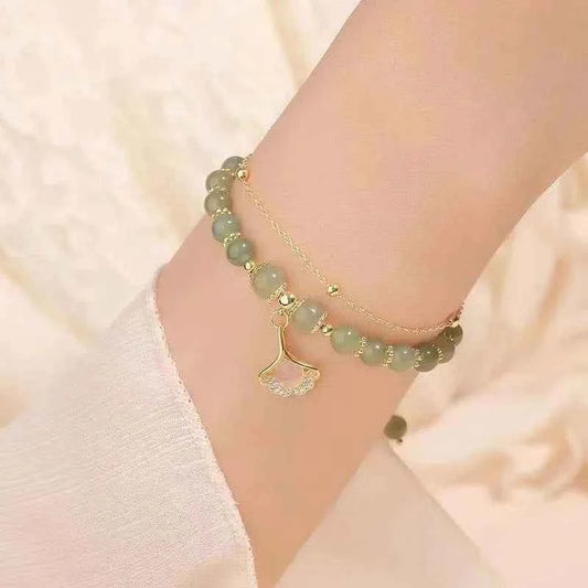 Bracciale Foglia Oro con Giada - Eleganza Naturale - Eleganza digitale